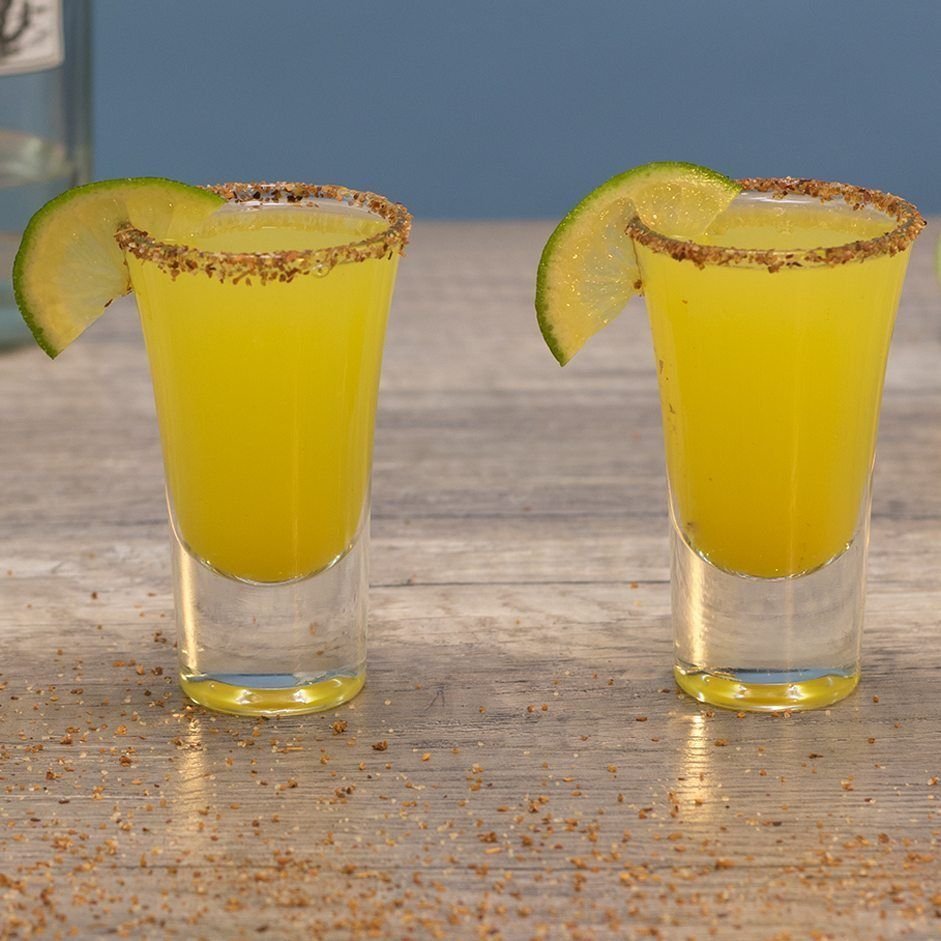 A two-sip shot and mango margarita pops  Tequila bottles, How to make  margaritas, Margarita shot